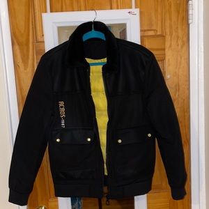 Medium black jacket. The jacket is very warm and it is in a very good condition